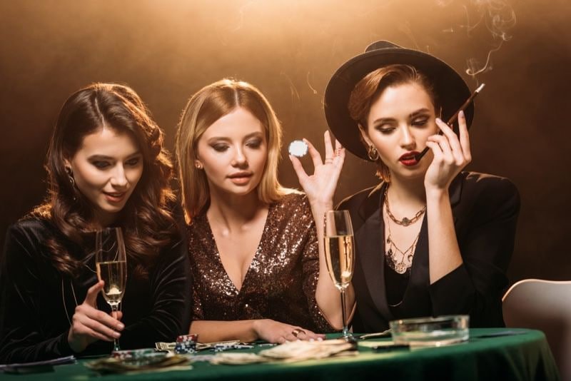 Filipino player at a live baccarat table on jdluxe from a smartphone